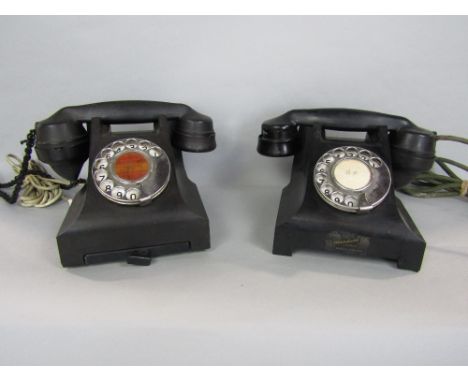 Two similar vintage bakelite telephones
