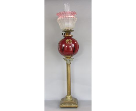 Interesting Corinthian column oil lamp, the etched shade over a sang de boeuf type glazed globe shaped reservoir, typical cas