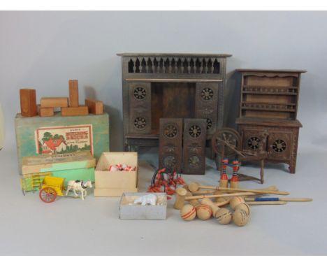  A collection of vintage toys including a William Britains Home Farm Series Tumbrel - lacks carter - original box, a Curva bu