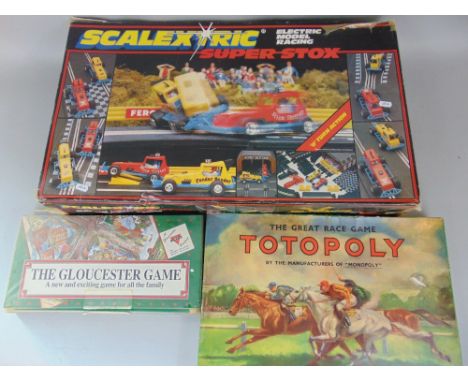 A mixed toy lot to include a Scalextric 'Super Stox' race set together with a totopoly set and The Gloucester Game (3)