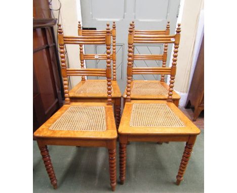 A set fo four mid-19th century Scandinavian dining chairs in maple with bobbin moulded forelegs and backs, with reeded splats