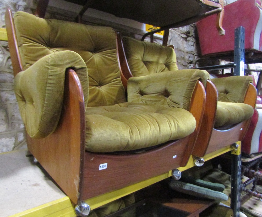 A G Plan saddle back lounge suite comprising three seat sofa and a pair