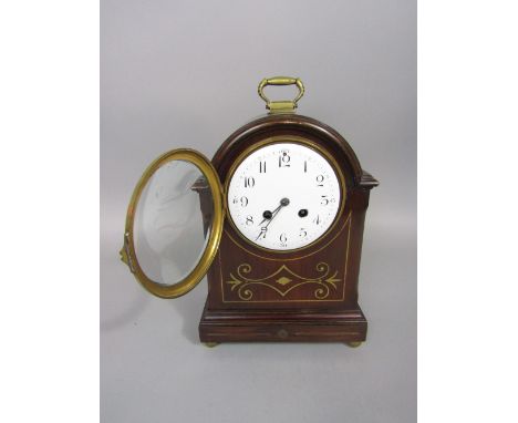 Good Edwardian mahogany and brass inlaid mantle clock with twin train enamel dial, with Arabic numerals, pierced brass grille