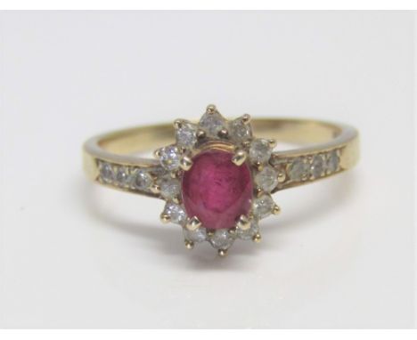 A 9ct ruby and diamond cluster ring, size K/L, 1.6g