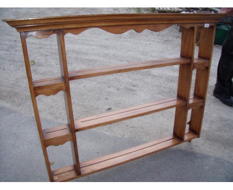 Stained pine three tier wall shelf (width 132cm) 