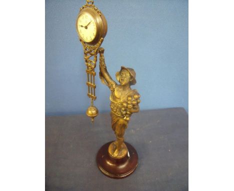 19th/20th C French bronze Mystique clock in the form of a boy selling onions (38cm high) 