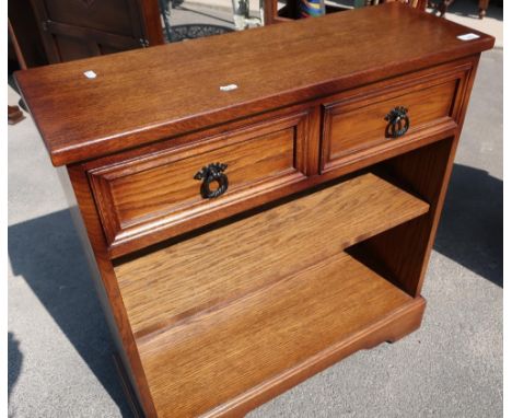 Small oak side cabinet/bookcase with two frieze drawers above open shelf base (75cm x 26cm x 80cm) 