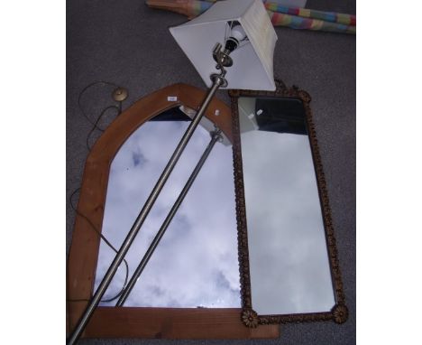 Pine framed Gothic style mirror, an oblong wall mirror in gilt frame and an anodized standard lamp 