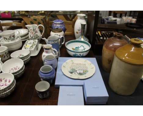 A collection of various decorative china to include a Ringtons tea caddy, Royal Copenhagen vase, Caughley jug, Wedgwood jug e