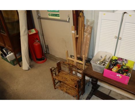 A Rowney travelling artists easel; two others; a folding magazine rack; and a bamboo shelf 