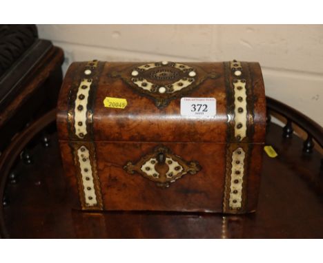 A Victorian walnut tea caddy