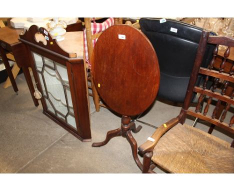 A mahogany snap top tripod occasional table