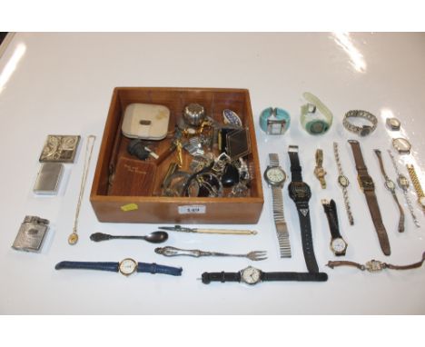 A box of small sundry items to include wrist watches, cigarette lighter, books etc.