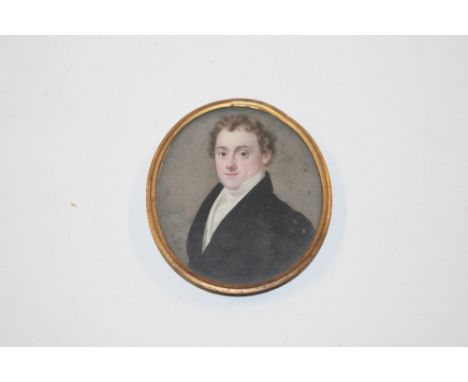 An oval miniature portrait with information verso