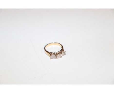 A 9ct gold ring, set with three white stones approx. 3.5gms, ring size N 