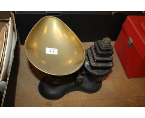 A SET OF CAST VINTAGE SCALES AND WEIGHTS  
