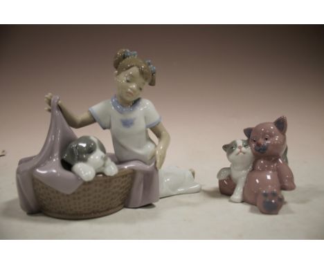 TWO NAO FIGURES; GIRL WITH DOG IN BASKET AND CAT WITH TEDDY BEAR 