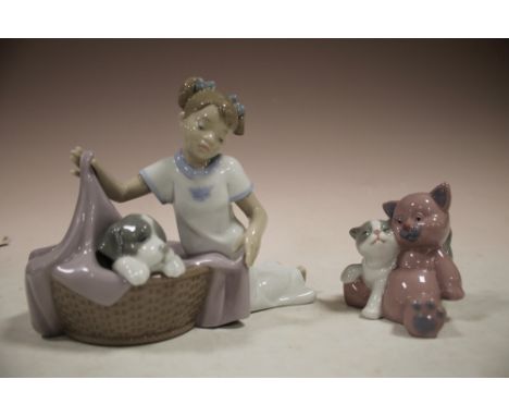 TWO NAO FIGURES; GIRL WITH DOG IN BASKET AND CAT WITH TEDDY BEAR 