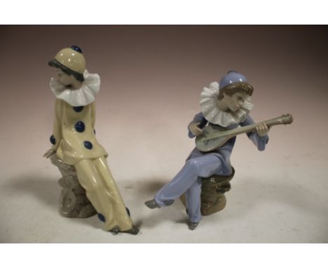 TWO SMALL NAO BOY FIGURES 