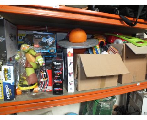 A COMPLETE SHELF OF CHILDRENS TOYS