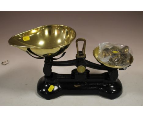 A CAST SET OF SCALES AND WEIGHTS 