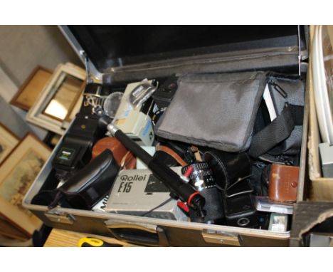 A SUITCASE OF VINTAGE CAMERA ACCESSORIES ETC.
