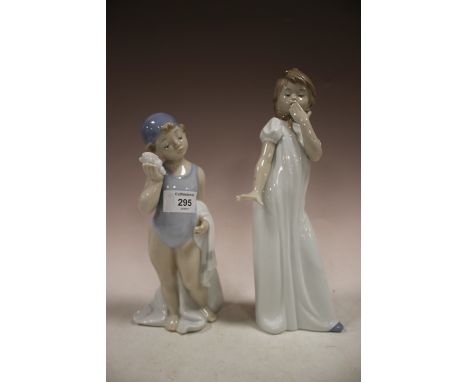 TWO NAO FIGURES YOUNG GIRL WITH CLAM SHELL AND NIGHT TIME GIRL 
