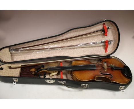 A CASED REPRODUCTION STRADIVARIUS VIOLIN 