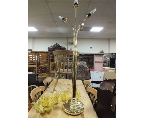 A BRASS EFFECT FLOOR STANDING LAMP