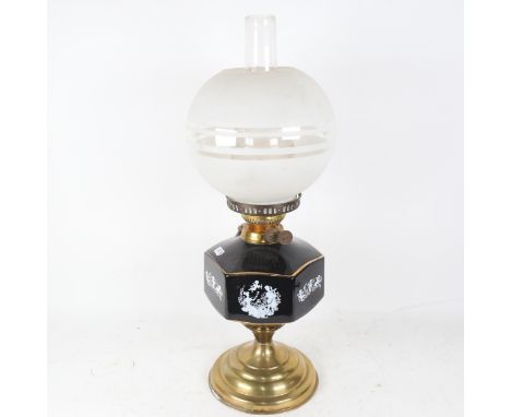 A Duplex brass oil lamp, with ceramic font and glass globe shade and funnel, overall height 55cm 