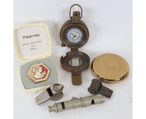 A Second World War Period Mark III compass, Metropolitan Police whistle, compacts etc 