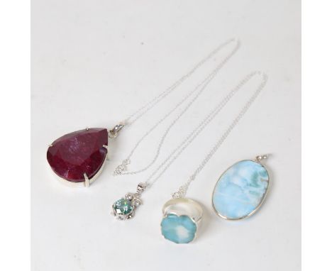 A large ruby pendant in sterling silver mount and chain, approximately 150ct, a Larimar silver-mounted pendant and matching r