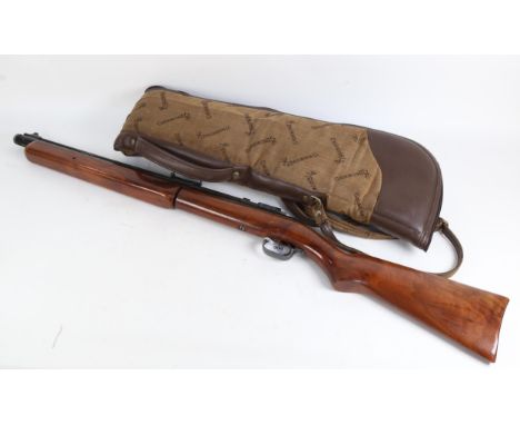 A Vintage Sheridan pump action air rifle, in calibre 5/M (.20), made in the USA, stamped the "Blue Streak", with walnut stock