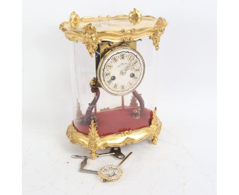 Modern gilded 8-day skeleton clock, case height 30cm 
