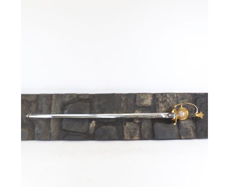 A Novo Centenary Her Majesty's Tower of London limited edition Wilkinson dress sword, with etched blad and 22ct gold plated h