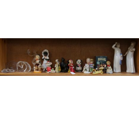 Various glass and porcelain ornaments, including NAO figures, moulded glass paperweights etc 