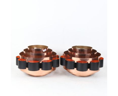 A pair of mid-century copper tiered light shades, diameter 27cm