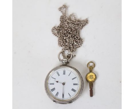 An early 20th century engraved silver-cased key-wind fob watch, with silver chain and key 