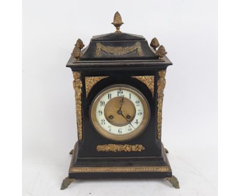 Ebonised and gilded 8-day mantel clock, movement striking on a gong, case height 36cm 