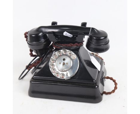A Vintage black Bakelite dial telephone 