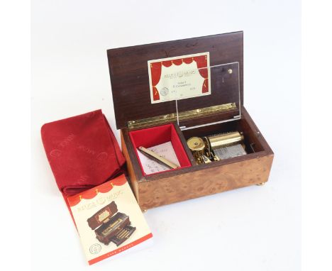 A Reuge Music cylinder music box, playing D Chostakovich, Valse no. 2, 1/36, no. 2135, case width 18cm, with manual and guara