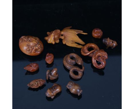 A group of modern carved wood miniature netsuke (boxful) 