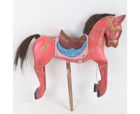 An Oriental carved and painted wood horse puppet, length 36cm 