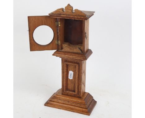 An oak table-top longcase clock pocket watch stand, height 29.5cm 