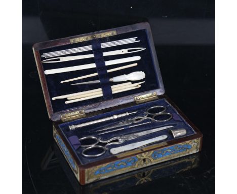 A 19th century brass marquetry and enamel inlaid sewing case, with fitted interior and accoutrements, length 17cmColoured ena