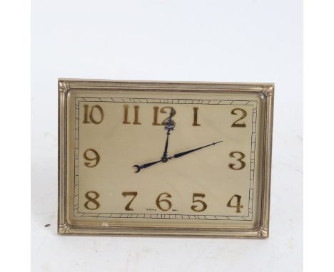 An Art Deco gilt-brass 8-day strut mantel clock, case height 12cm 