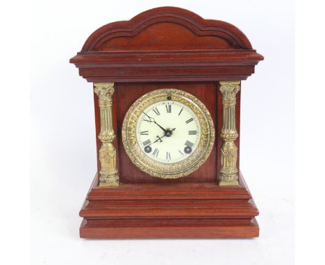 Mahogany and brass architectural 8-day mantel clock, case height 27cm 