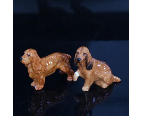 A Royal Worcester Cocker Spaniel dog, model no. 2944, and another, height 6cm (2) 