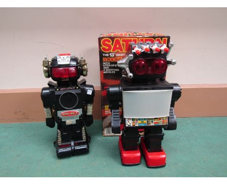 Two 1980's battery powered plastic robots to include "Magic Mike II" and boxed "Saturn the 13" Great Walking Robot" with TV s