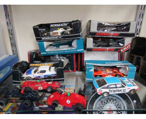 Eight playworn Scalextric slot racing cars includng C.013 Tiger Speckal Sports Car, C.130 Triumph TRF, C.428 Porche C.283 Rov